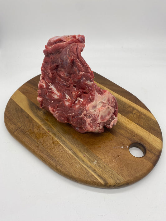 Photo - Goat neck on a wooden board