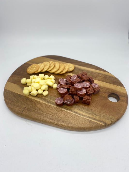 Photo - Emu kabana on a wooden board with cheese and crackers 
