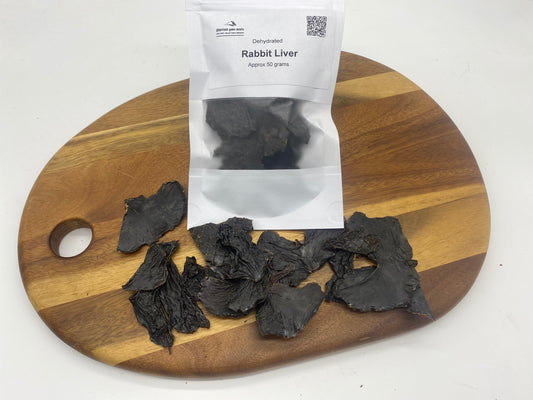 Photo - Rabbit liver dehydrated on a wooden board with resealable bag