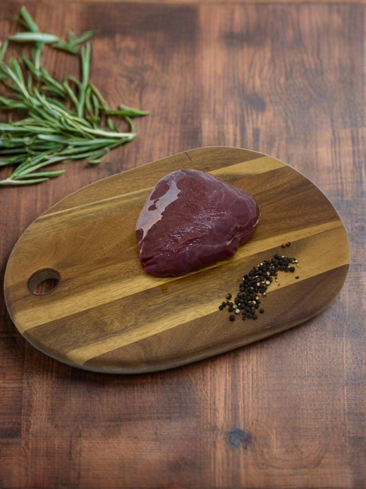 Kanagroo Rump Roast on a wooden board