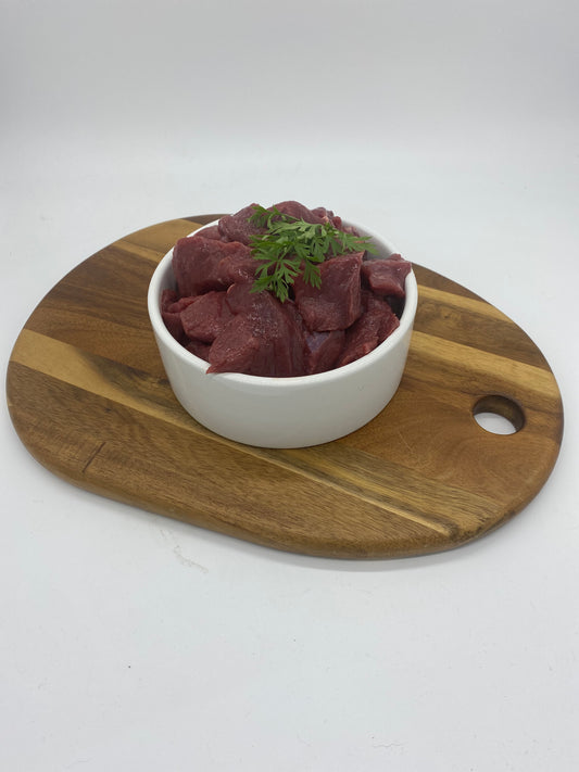 Photo - Diced goat in a dog bowl 
